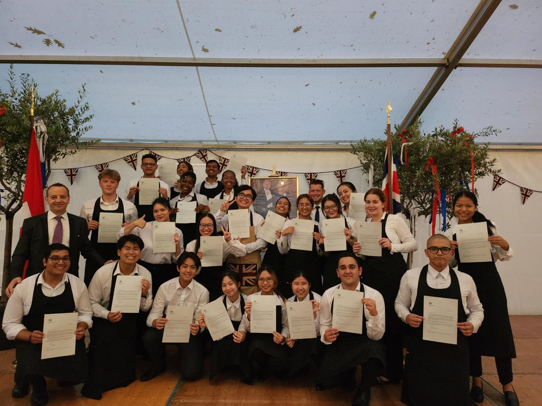 IMI Switzerland volunteer at the King's Birthday Celebration